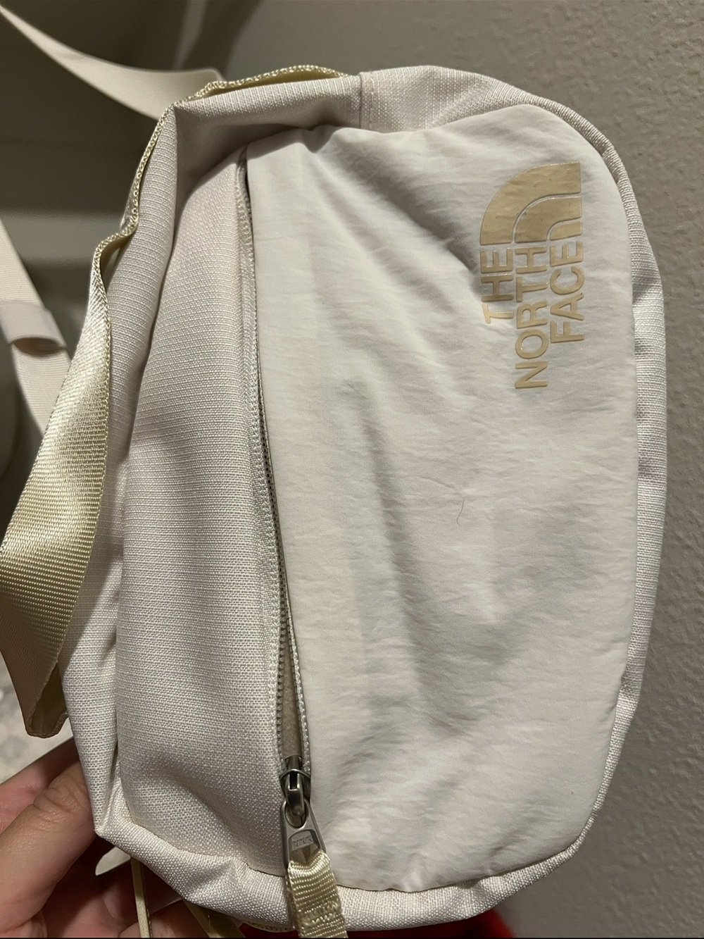The North Face Cream Crossbody Bag with Subtle Gold Logo